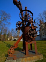 This is a sculpture standing in the garden from the old castle in Bienne. It had been created from scrap metal This is a sculpture standing in the garden from the old castle in Bienne. It had been created from scrap metal